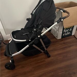 Chic Black Stroller with Brown Accents